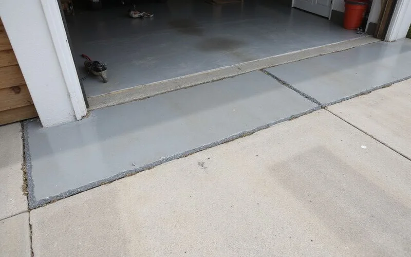 Finished garage apron sitting flush with the garage slab
