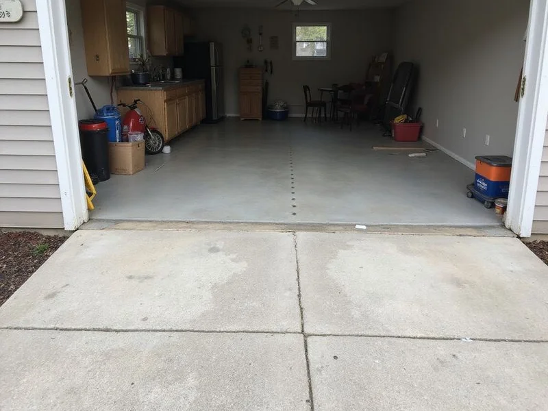 After: Driveway apron, Hartford ring town. Settled section lifted back to grade in a single visit.